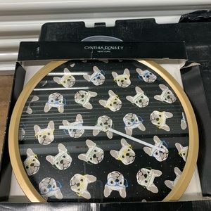 New in box wall clock with cute dog design. Approx 14”